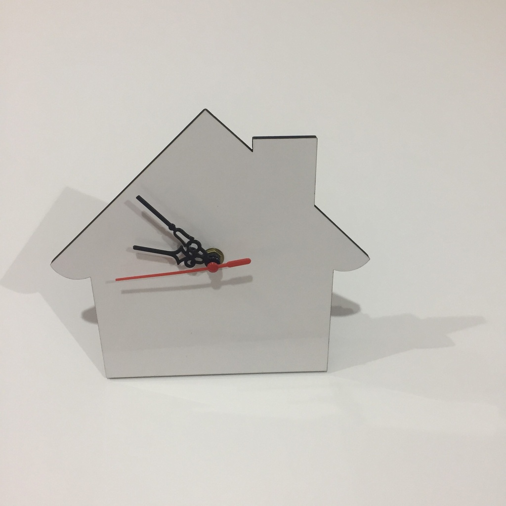 MDF in the shape of a house with a clock