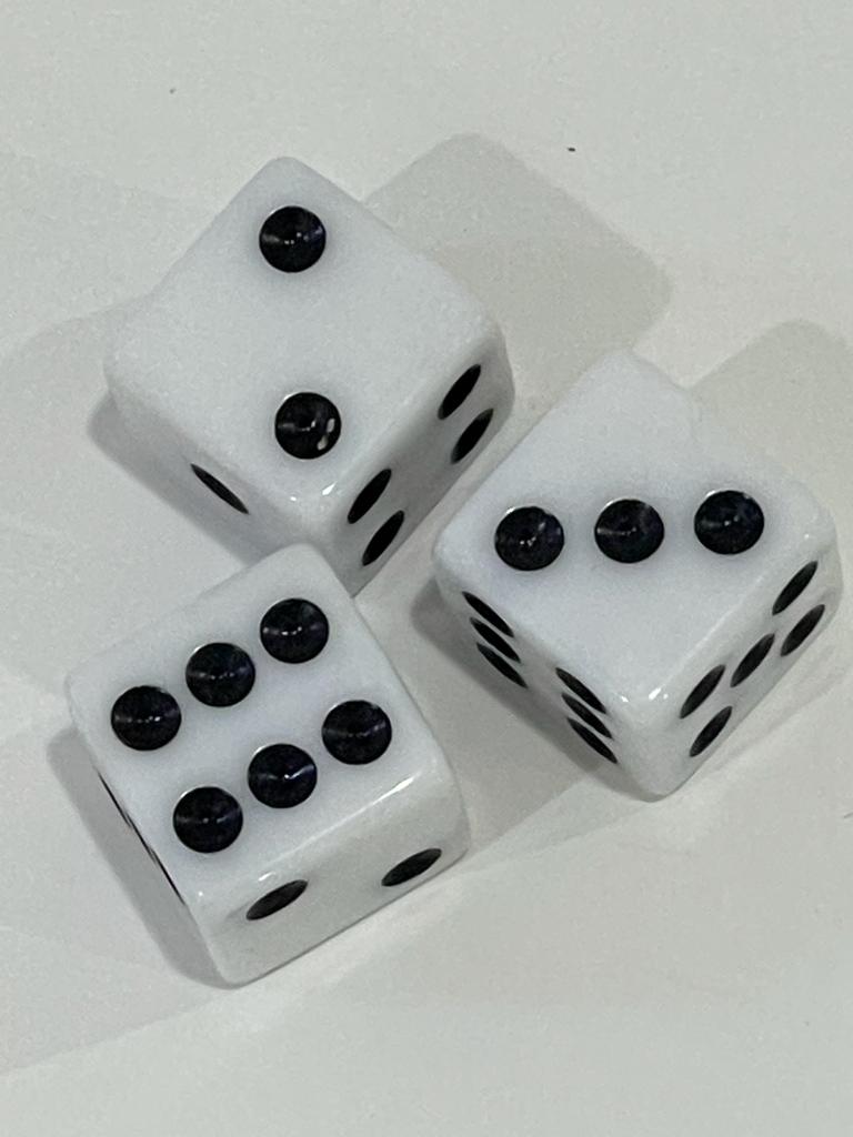 Dice measuring 1.5 cubic centimeters