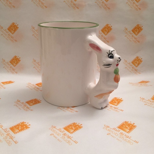 Ceramic mug with rabbit-shaped handle